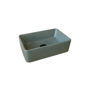 A small rectangle concrete basin with a black waste plug. The basin is a fun deep moss in colour and the background is white.